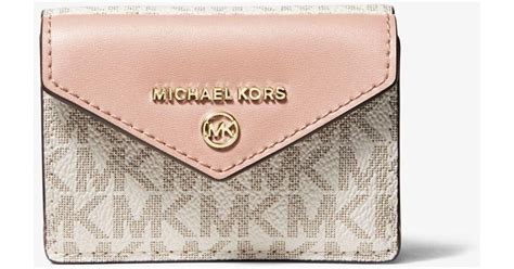 michael kors mercer lg trifold wallet|Michael Kors jet set charm.